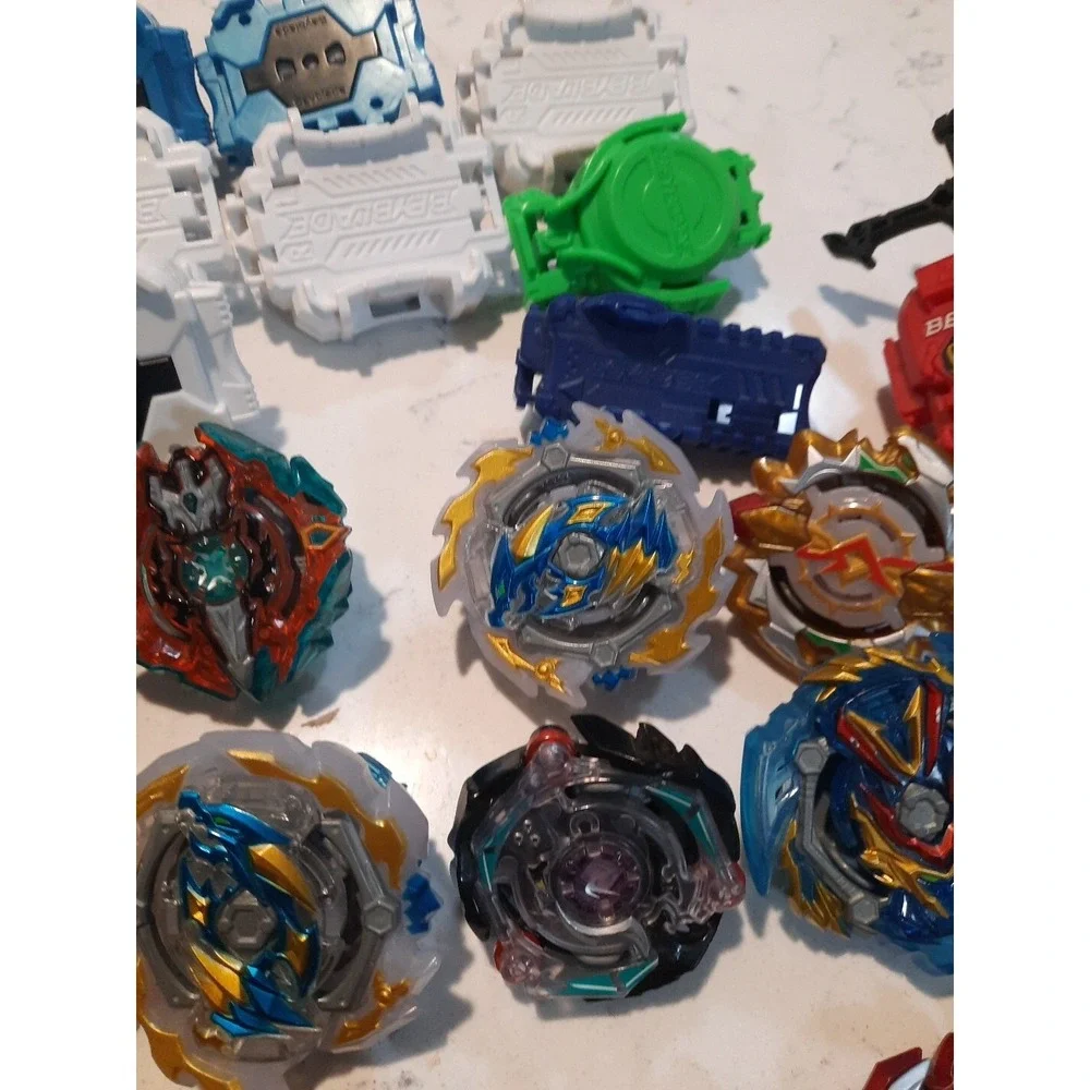 Lot Of 8 Beyblade And Different Parts